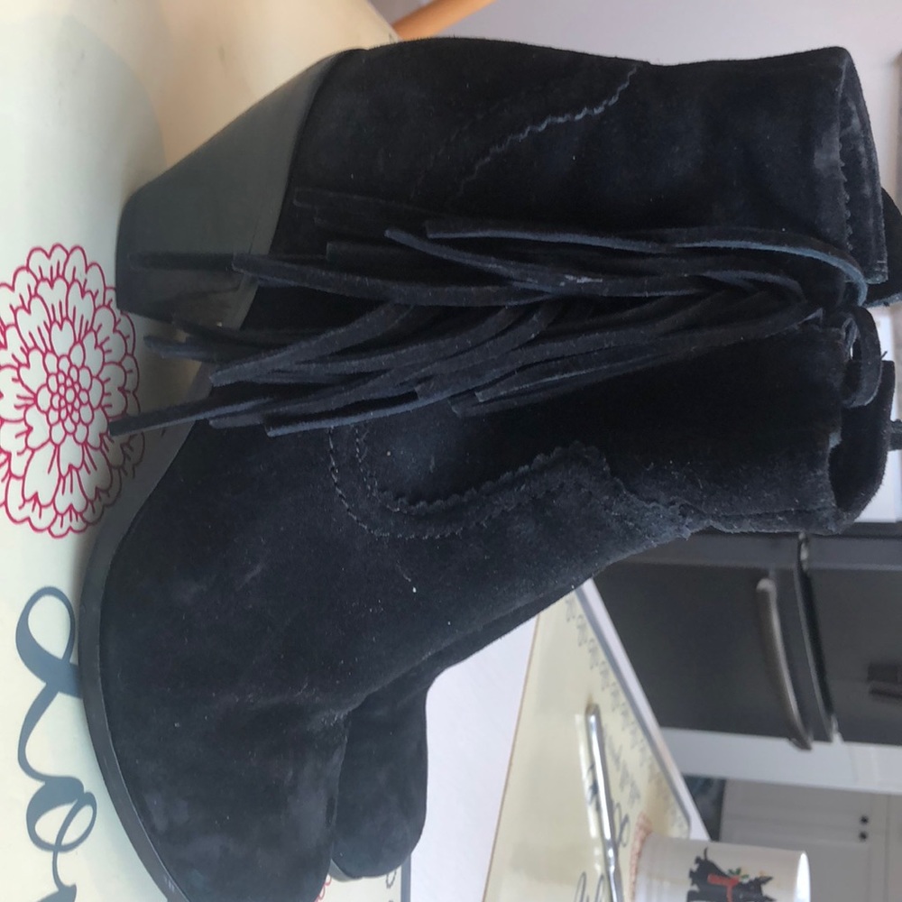 Black suede boots.